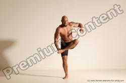 Underwear Gymnastic poses Man Black Muscular Bald Dancing Dynamic poses Academic